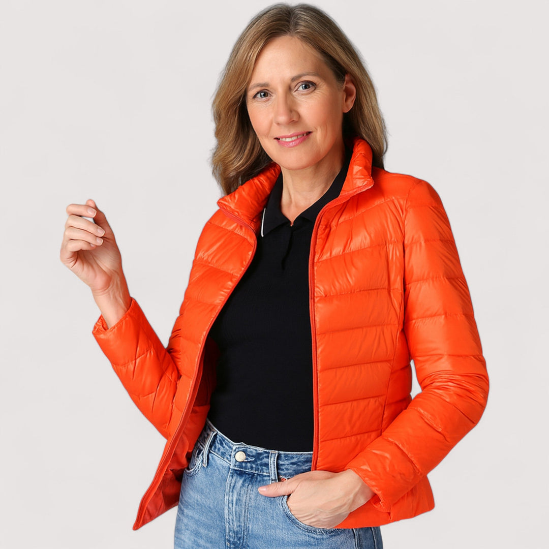 Ami - Ultralagana pernata jakna za putovanja