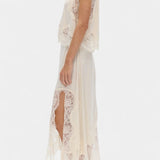 Nada Midi Suknja s Čipkastim Detaljima i Asimetričnom Porubom